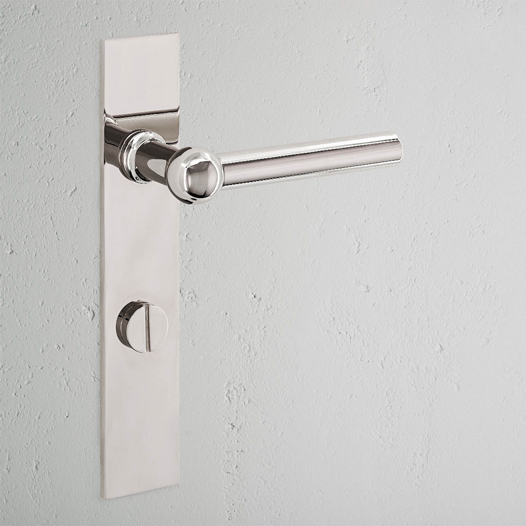 Harper Klamka do drzwi bez sprężyny z długim szyldem i blokadą obrotową – Polerowany nikiel