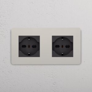 Grove Gniazdo Schuko/Bipasso x 2 w podwójnej ramce – Polerowany nikiel, Czarny