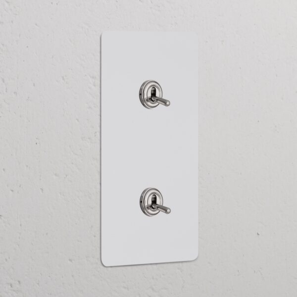 Kew Włącznik dźwigniowy x 2 w podwójnej ramce pionowej – Polerowany nikiel do malowania