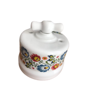 Ceramiczny natynkowy włącznik pojedynczy/schodowy biały ze zdobieniem łowickim